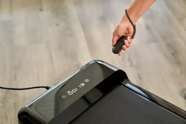 Remote control used to change speed on the KingSmith WalkingPad C2